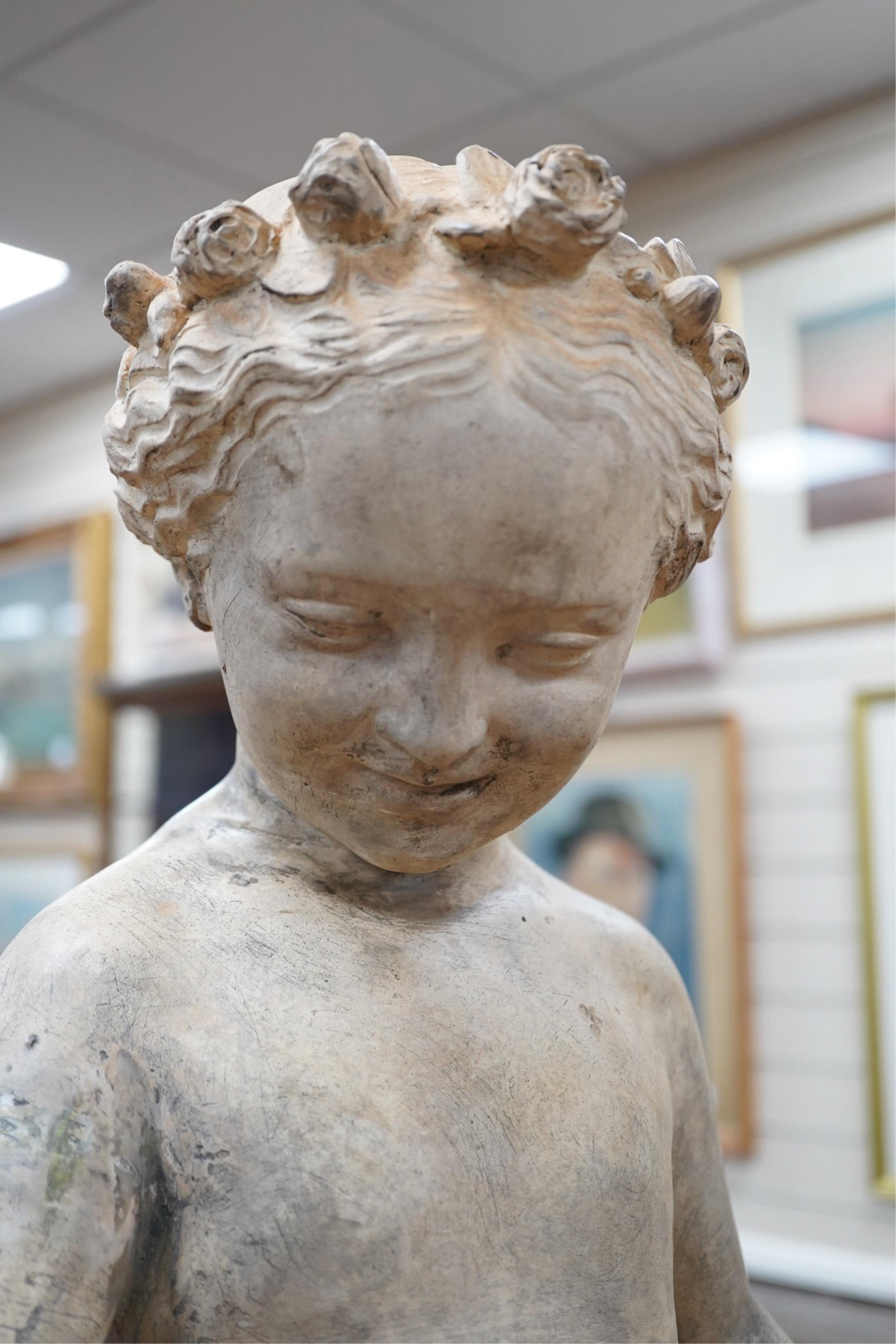A large terracotta figure of a flower maiden, emblematic of summer, 80cm tall. Condition - repaired
